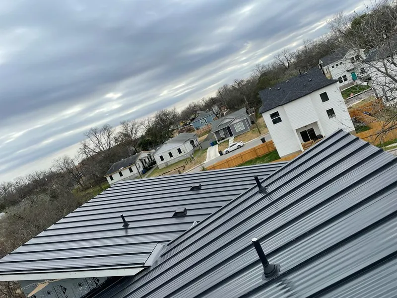 Standing seam metal roof panels with vents for Skylight Repair in Le Mars